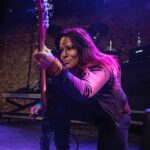 Photo of Jennifer Finch of the band L7