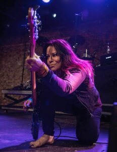 Photo of Jennifer Finch of the band L7