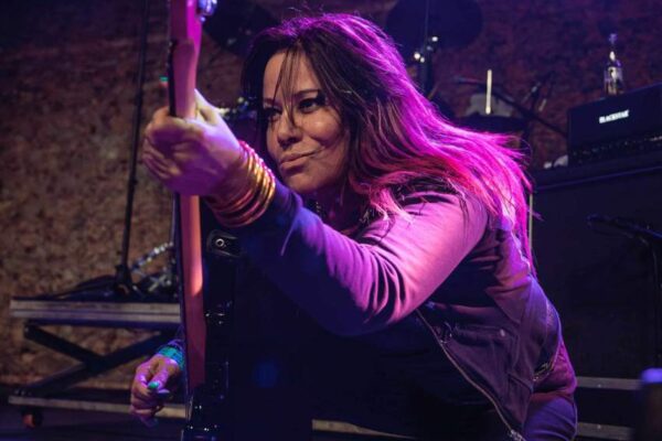 Photo of Jennifer Finch of the band L7